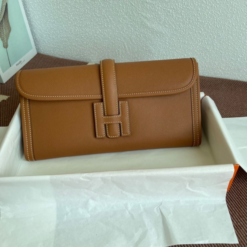 H**mes clutch bags